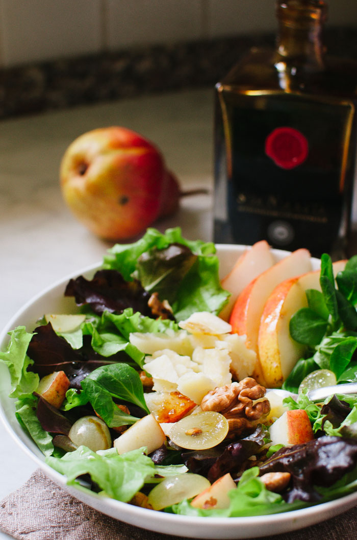 This quick and tasty autumn salad is a lovely combination of pears, grapes, walnuts, Parmigiano Reggiano cheese, and mixed greens.|Very EATalian