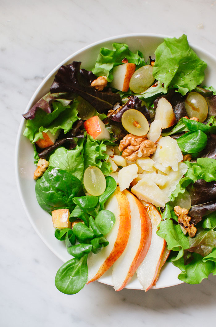 This quick and tasty autumn salad is a lovely combination of pears, grapes, walnuts, Parmigiano Reggiano cheese, and mixed greens. |Very EATalian