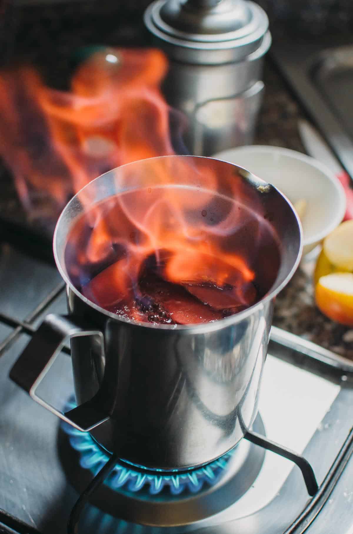 This soul-soothing Vin Brule' (Italian mulled wine) is simply made with wine, sugar, cinnamon, apples, and cloves. | Very EATalian